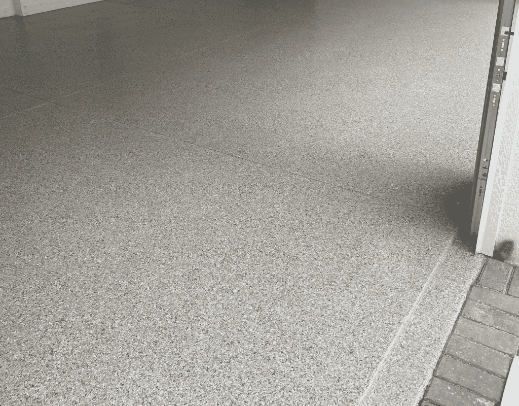 Armor-On Floor Coatings Central Florida polyaspartic concrete coating applied in garage space