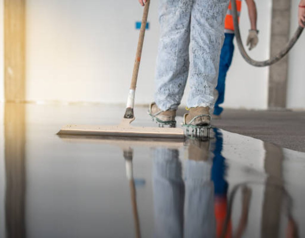 Close-up of a high-gloss epoxy finish applied by Armor-On Concrete Coatings experts